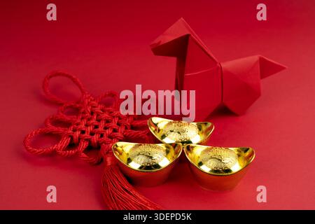Horse origami and Lunar New Year Decorations 2026 Year of the Horse concepts on red background Stock Photo