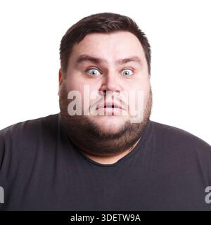 Shocking news. Wonder man expressing amaze on face Stock Photo