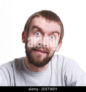Shocking news. Wonder man expressing amaze on face Stock Photo