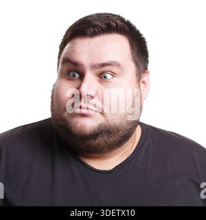 Shocking news. Wonder man expressing amaze on face Stock Photo