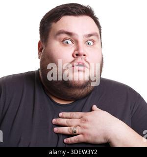 Shocking news. Wonder man expressing amaze on face Stock Photo
