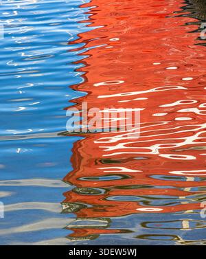 Reflections of sailboats on the water, background image Stock Photo