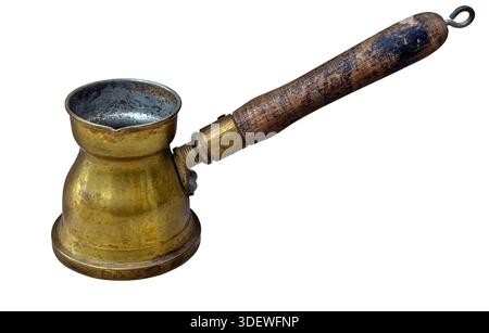 Antique brass jezve with a wooden handle on a transparent background for coffee brewing Stock Photo