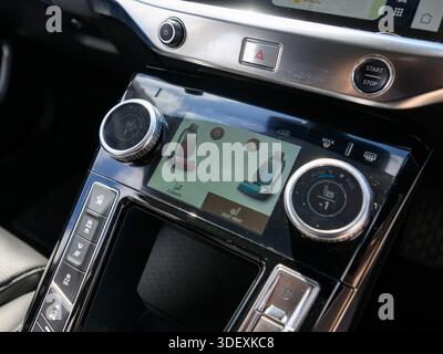 A modern car infotainment screen displays heated and ventilated seat controls, highlighting advanced comfort features, climate customization, and user Stock Photo