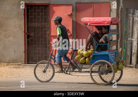 Rickshaws are a common form of transport in India, as seen in this ...
