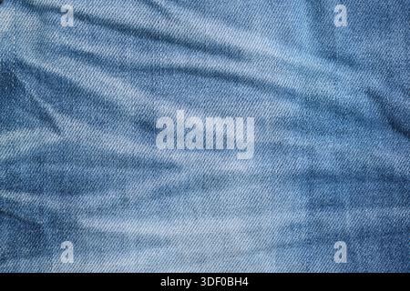 Denim jeans texture or denim jeans background with seam and thread Stock Photo