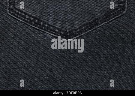 Black jeans texture or denim jeans background with seam and rivets Stock Photo