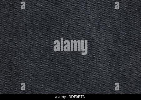 Close up of black jeans fabric texture background Stock Photo