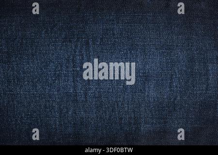Denim jeans texture or denim jeans background. Dark blue jeans fabric Stock Photo