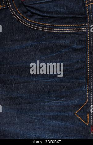 Denim texture. Denim jeans background with seam of blue jeans Stock Photo