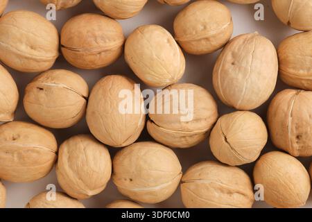 Walnuts on white background, close up, top view Stock Photo