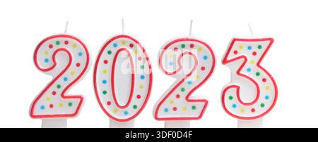 Candles with numbers year 2023 on white background Stock Photo
