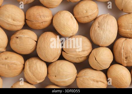 Walnuts on white background, close up, top view Stock Photo