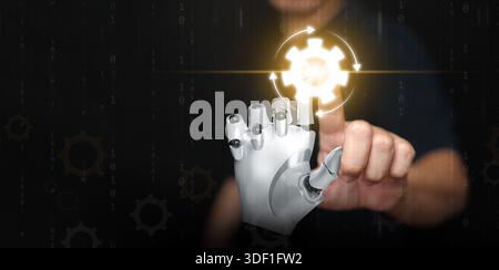 Human and robot hand collaborating to activate automation system icon, symbolizing AI technology integration, machine learning, and future innovation Stock Photo