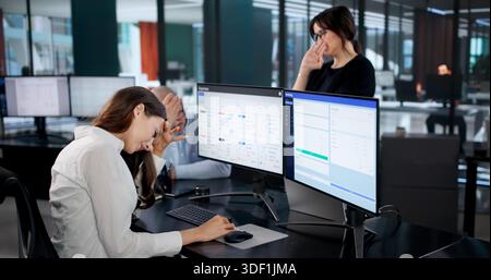 Office Team In Crisis, Upset Over Budget, Confused By Tax. Possible Professions: Accountant, Business Analyst Stock Photo