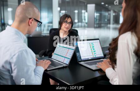 Collaborative Data Analysis Meeting: Diverse Team Of Professionals Working Together Stock Photo