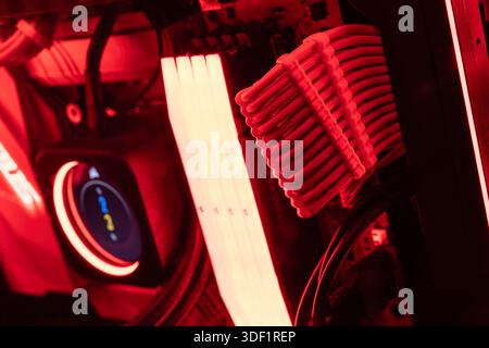 Rome, italy 1 january 2026: enthusiast gaming pc components inside a modern computer case, featuring illuminated liquid cooling, ram modules, and slee Stock Photo