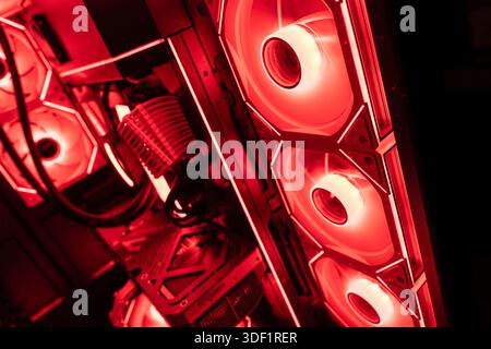 Rome, italy 1 january 2026: gaming pc interior showcasing red rgb cooling fans, advanced liquid cooling, and powerful computer hardware for high perfo Stock Photo