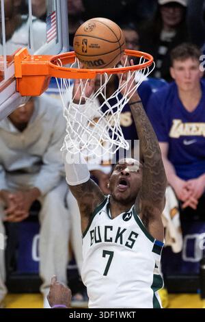 Milwaukee Bucks' Kevin Porter Jr. smiles during an NBA basketball game ...