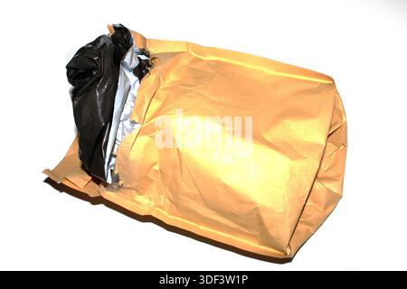 Packing envelope padded mailer bag opened and empty recycling shipping postal waste Stock Photo