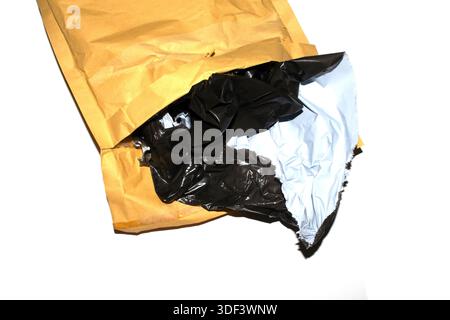 Packing envelope padded mailer bag opened and empty recycling shipping postal waste Stock Photo