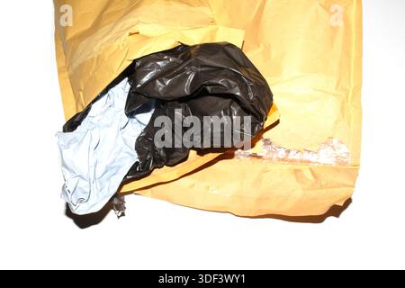 Packing envelope padded mailer bag opened and empty recycling shipping postal waste Stock Photo