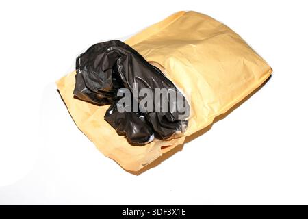 Packing envelope padded mailer bag opened and empty recycling shipping postal waste Stock Photo