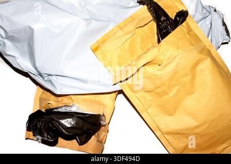 Packing envelope padded mailer bag opened and empty recycling shipping postal waste Stock Photo