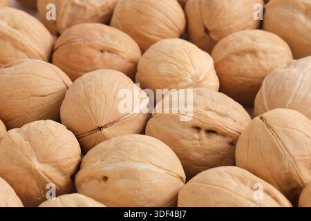 Walnut background. Walnuts in close-up. Healthy food Stock Photo