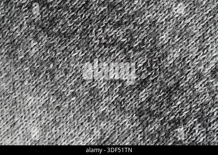Closeup of melange knitwear in white, black and gray gradient background Stock Photo