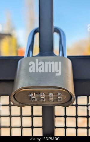 Close up of a gold combination closed padlock Stock Photo