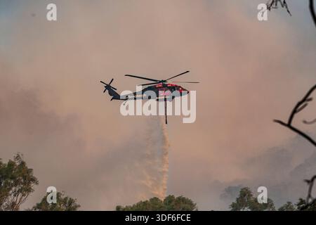 Alexandra, Australia. January 10th 2026, Creightons Creek, Australia. Helicopters drop water on a fire burning in Creightons Creek. Credit: Jay Kogler/Ģ����ý Live News Stock Photo