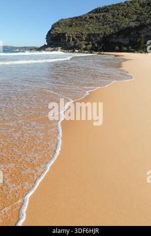 Putty Beach on Central Coast NSW Australia - Wave rolling up the sand. Stock Photo