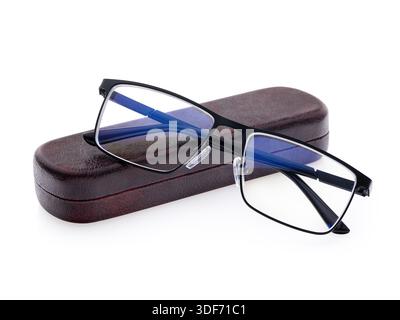 Reading glasses, anti-glare with diopters and closed leather case, isolated on a white background, without brand Stock Photo