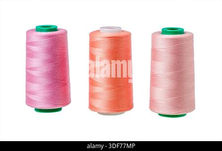 Spools of thread isolated on white background. Clipping path. Set of different sewing spool with threads. Stock Photo