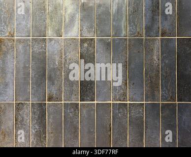 Dark blue wall texture in the form of tiles in the toilet, textured wallpaper, abstract wall The pattern is very detailed Stock Photo