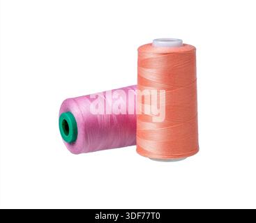 Spools of thread isolated on white background. Clipping path. Set of different sewing spool with threads. Stock Photo