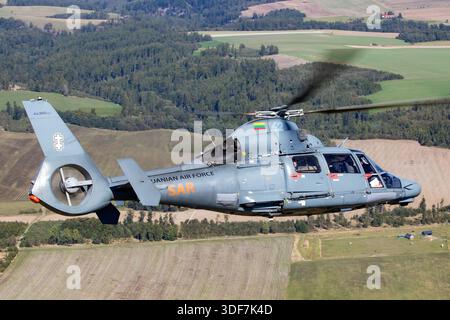 The image shows a Lithuanian Air Force search and rescue helicopter ...