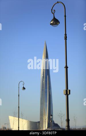 High lamppost above skyscraper, low angle Stock Photo