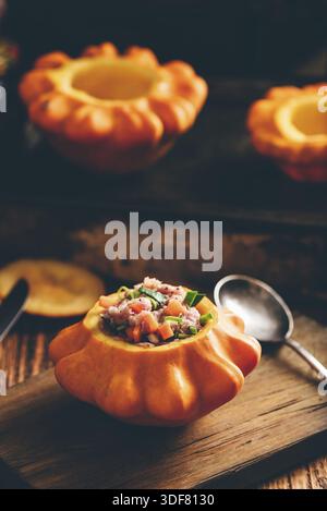 Yellow pattypan squash filled with ground beef and vegetables Stock Photo