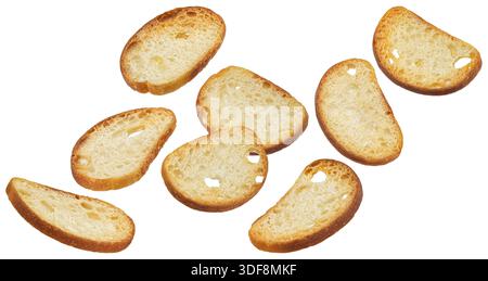 Bruschetta crackers, falling bread croutons isolated on white background Stock Photo