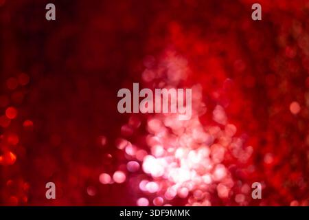 Vibrant Red Abstract Bokeh Background with Glowing Light Spots for Creative Designs Stock Photo
