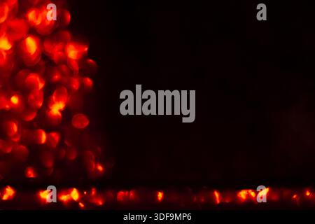 Abstract Red Bokeh Lights on Dark Background for Festive and Artistic Design Stock Photo