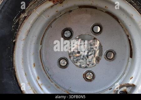 Close up at large wheel. Inside the tire. No bolts. Stock Photo