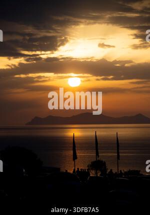 The sun going down over the Caldera of Santorini Stock Photo