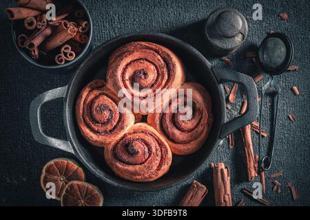 Tasty cinnamon buns as christmas dessert. Popular Swedish dessert. Swedish cuisine. Stock Photo