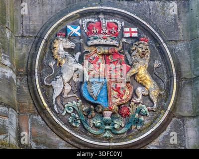 A weathered Royal Coat of Arms of the United Kingdom, Scottish version, on display in Edinburgh, Scotland, UK. Stock Photo