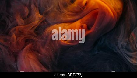 Ink vapor drop glitter fume rainbow broken glass Stock Photo