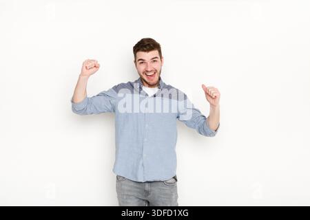 Excited man very glad to success Stock Photo