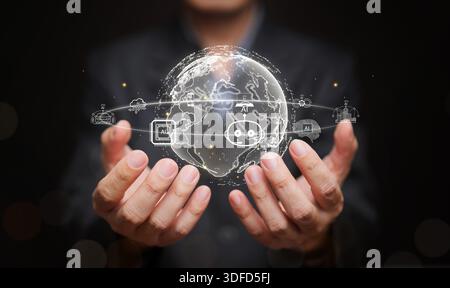 The world driven by AI concept. Businessman holding digital globe with artificial intelligence icons. Global Ai integration in robotic, smart city, au Stock Photo
